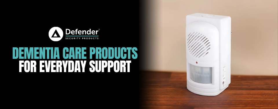 White motion-sensing dementia care device from Defender Security Products placed on a wooden surface.